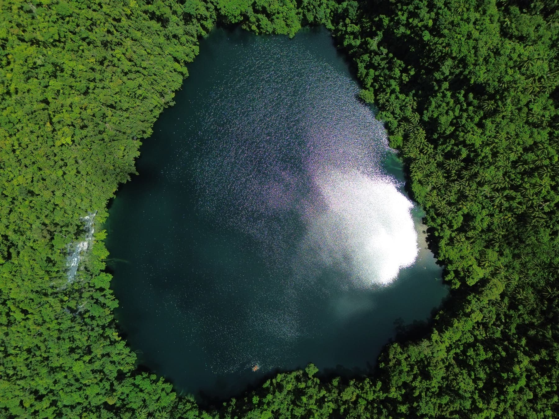 Sunlight falling across the surface of Bababu Lake, seen from the air